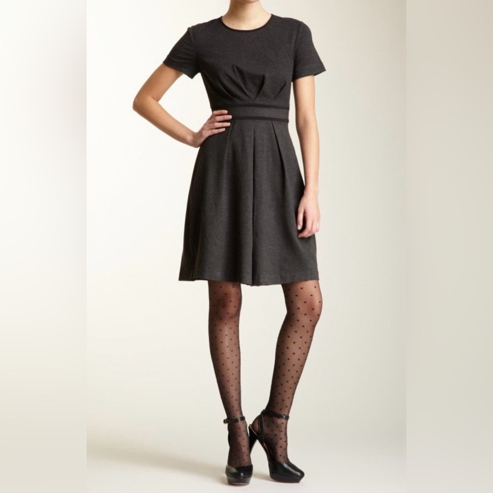 Trina Turk short-sleeve dress with a fit-and-flare silhouette and a banded waist